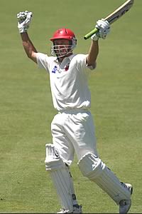 Young celebrates his century, South Australia v Queensland, Pura Cup, 2002/03