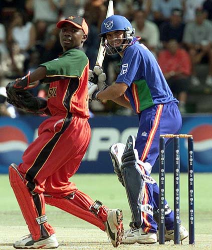 Stephan Swanepoel and Zimbabwe wicket keeper Tatenda Taibu watch an edged shot at the Harare Sports Club