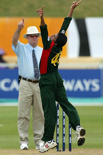 Ehsanul Haque celebrates after umpire Russell Tiffin gives Shivnarne Chanderpual out LBW