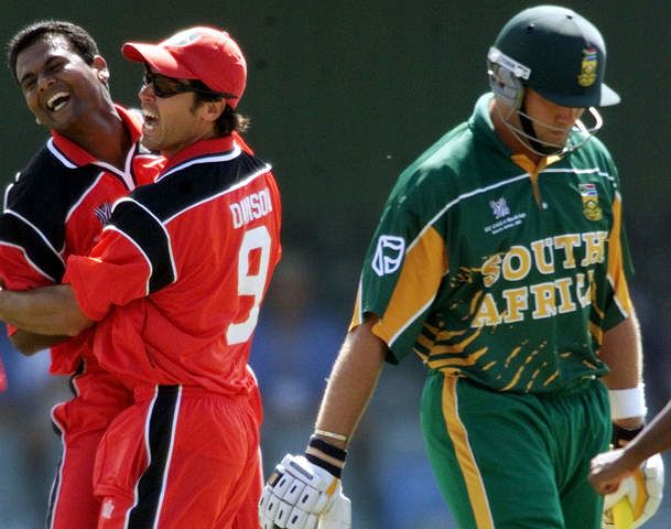 Ashish Patel celebrates with team-mate John Davison after taking the wicket of Jacques Kallis