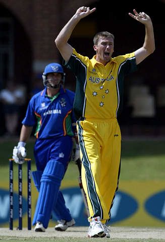 Glenn McGrath celebrates taking the wicket of Bryan Murgatroyd for a duck