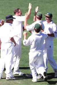 Penn celebrates with team mates, Central Districts v Australians, 1999/2000