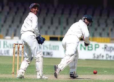 Left-hander Akhtar Sarfaraz of NBP plays one to the fine-leg boundary