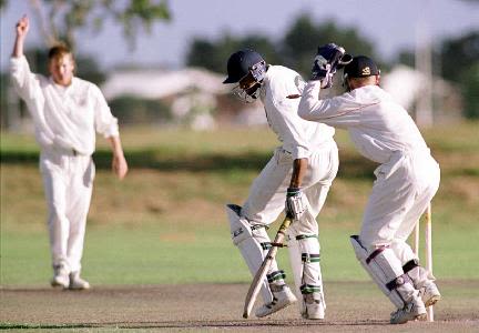 John Crawley stumps Eugene Moleon off the bowling of Gary Yates