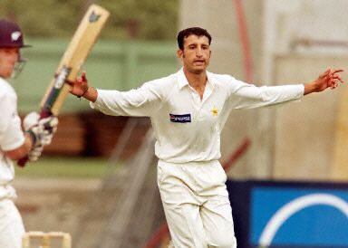 Fazl-e-Akbar celebrates the wicket of Craig McMillan