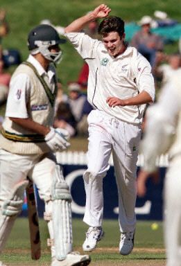 Pace-man James Franklin celebrates taking one of his four wickets