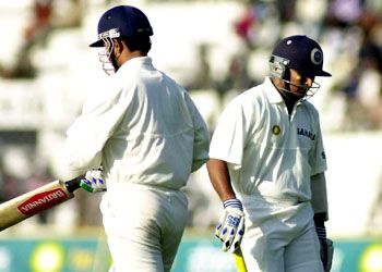 A dejected Dasgupta walks back after being run-out in the Indian second innings