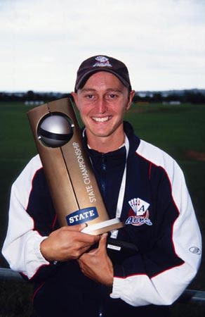 Walker with the State Championship trophy. State Championship: Auckland v Wellington at Auckland, 24-27 Mar 2002