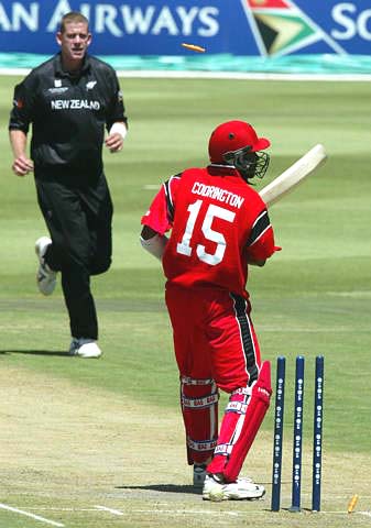The bails fly off the stumps as Jacob Oram cleans up Austin Codrinton