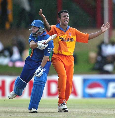 Bryan Murgatroyd runs into Holland's Adeel Raja, as Raja appeals for an LBW at Bloemfontein