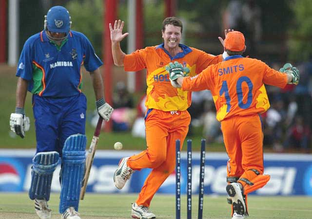 Jan Kloppenburg celebrates with wicket-keeper Jeroen Smits after bowling Namibia's Danie Keulder