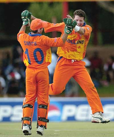 Jan Kloppenburg celebrates with wicket keeper Jeroen Smits as another Namibian wicket falls in Bloemfontein