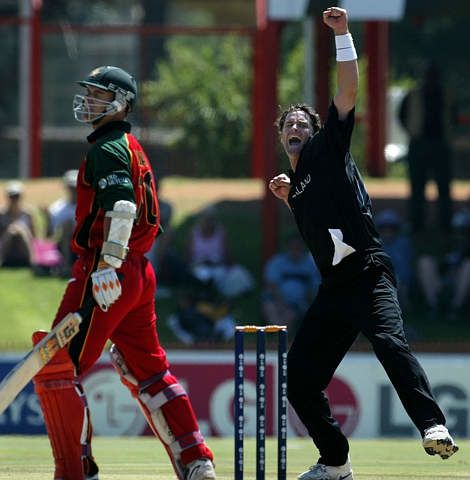 Cairns punches the air in delight after getting Wishart