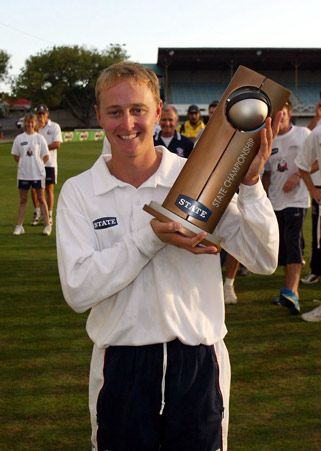 Walker holds the 2002/03 State Championship trophy. State Championship: Auckland v Northern Districts at Auckland, 17-20 Mar 2003