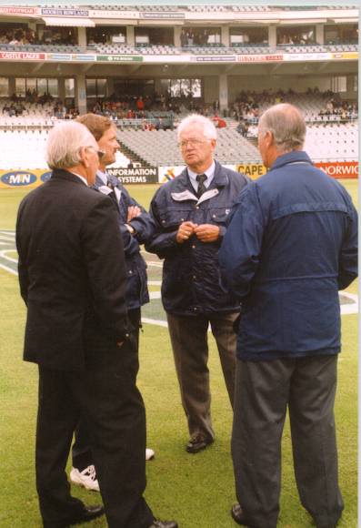 Match referee John Reid with match umpires Cyril Mitchelly and Rudy Kroetzen