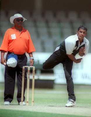 Off-spinner Murtaza Hussain of KRL in action during the 1st semi-final of NBP Cup