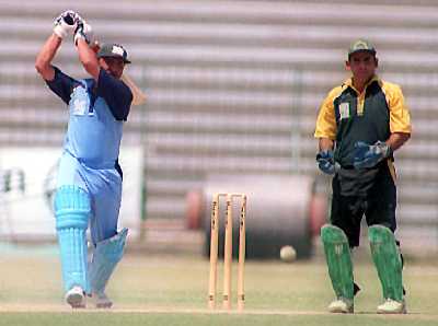 Naseem Khan of Customs who made 45 runs & Tahir Rasheed