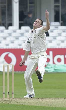 Gareth Clough bowls from the Trent Bridge Pavilion End