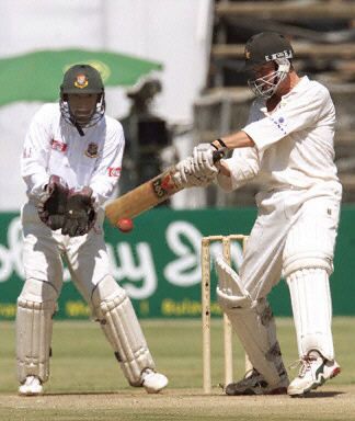Grant Flower cuts as keeper Mehrab Hossain watches