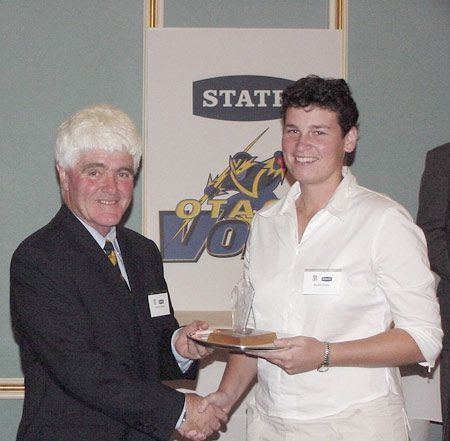 Pullar is presented the 2001/02 Otago women's player of the year award