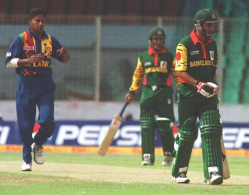 Shahriar Hossain departs after being caught by De Silva off the bowling of Vaas