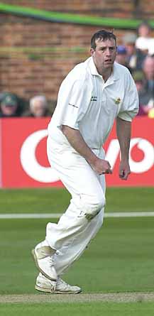 Tim Munton of Derbys ; bowling portrait