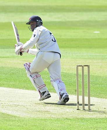 Graham Lloyd turns a ball off his legs