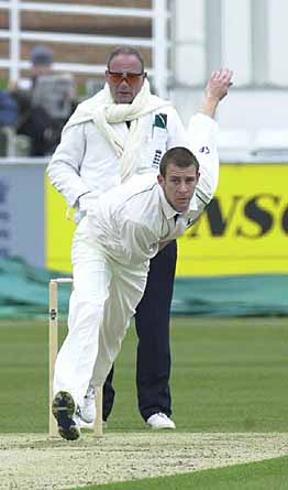 Gareth Clough bowling from the Lumley End