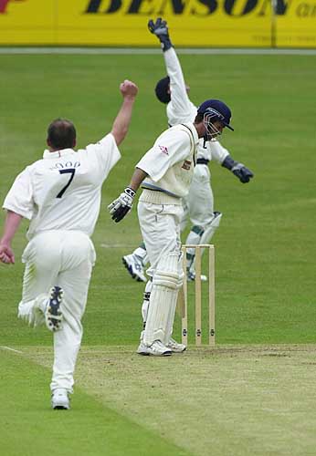 Michael Vaughan is caught behind off the bowling of John Wood