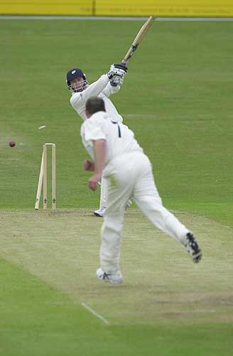 Craig White is clean bowled by Wood for 10