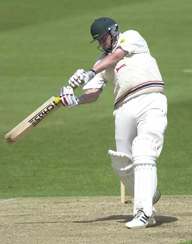 Leics Carl Crowe smacks a John Wood delivery for 4 runs