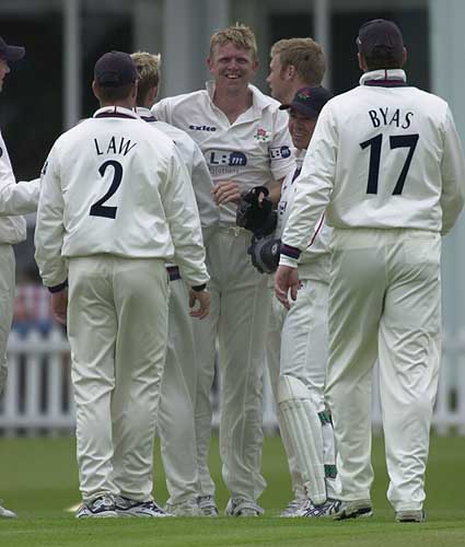 Peter Martin is pleased enough to get the wicket of Ward for 7