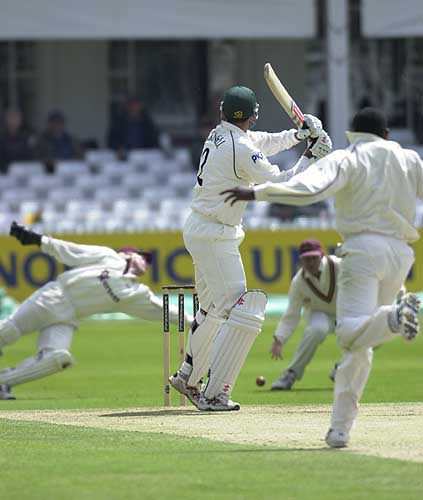Darren Bicknell edges an Anderson delivery short of the diving Toby Bailey behind the stumps