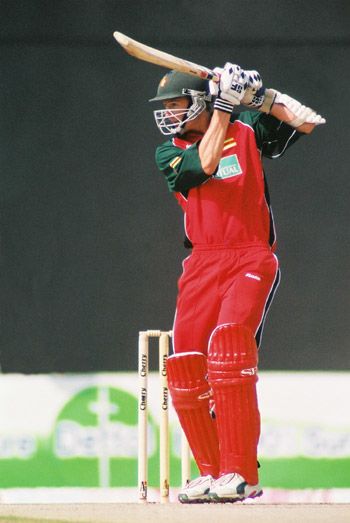 Douglas Marillier drives for a boundary