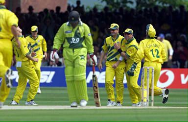 Pakistan's opening batsman Wajahatullah Wasti (C) walks