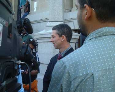 Derek Crookes speaking to the media on Thursday