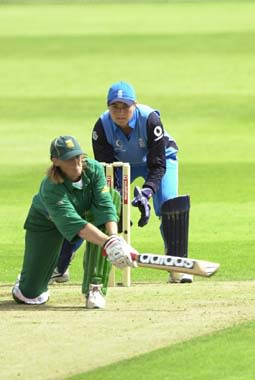 Helen Davies of South Africa sweeps to the legside