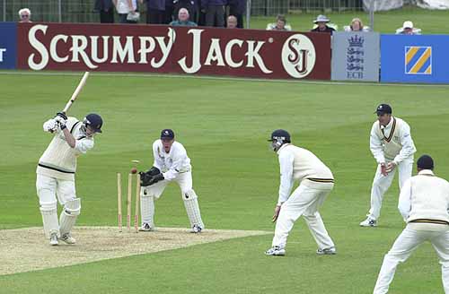 Dowman is bowled by Phillips for 45