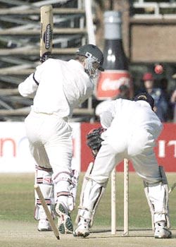 Brian Murphy loses his leg stump to a sharply turning ball from Harbhajan