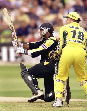 Saleem Elahi sweeps the ball towards the boundary on the way to scoring his fifty