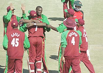 King and Jacobs embrace after combining to dismiss Dion Ebrahim
