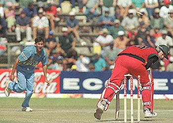 Bryan Strang's off bail is dislodged by Agarkar