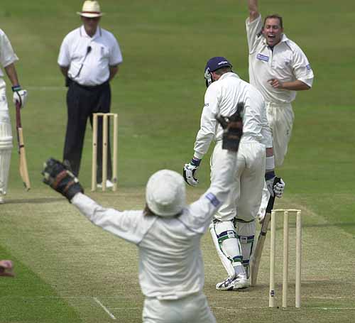Yorks skipper Byas is caught by Russell off Averis for 1