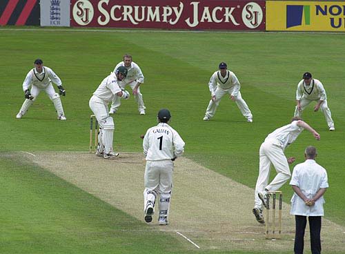 Darren Bicknell opens the Notts second innings as Kevin Dean bowls from the pavilion end.