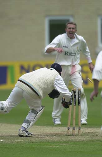 Derbyshire keeper Karl Krikken effects the run out of Nicky Boje for 10 in the Notts second innings