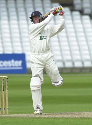 Chris Bassano of Derbys whacks a four off the bowling of Richard Logan
