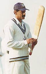 Utpal Chatterjee takes a break while batting
