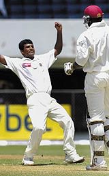 Tareq Aziz Khan celebrates the dismissal of Chris Gayle