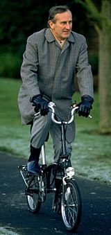 Ted Dexter gets on his bike