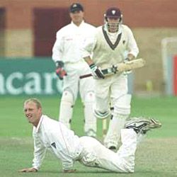 Gary Keedy fails to stop a straight drive from Mike Burns